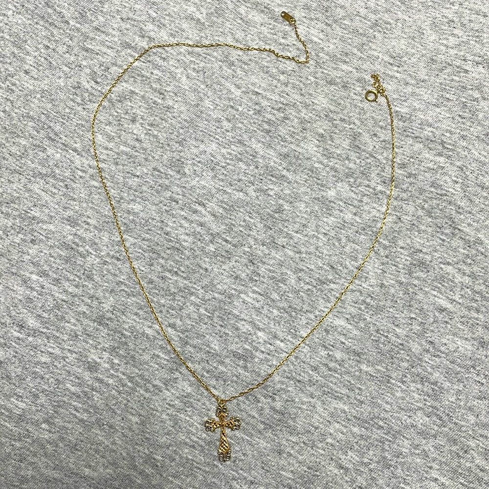 Gold necklace with pendent included. Pendent is gold and silver